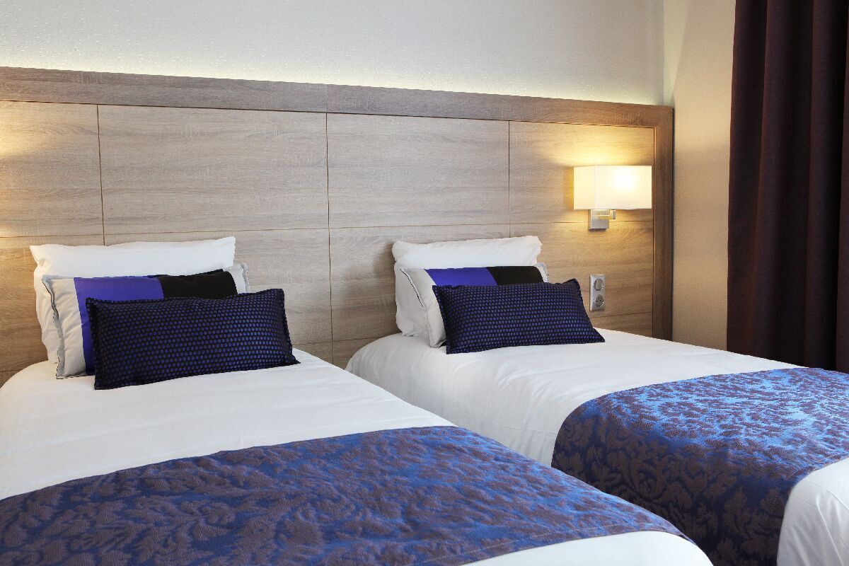 Premium bedding, memory-foam beds, in-room safe, desk