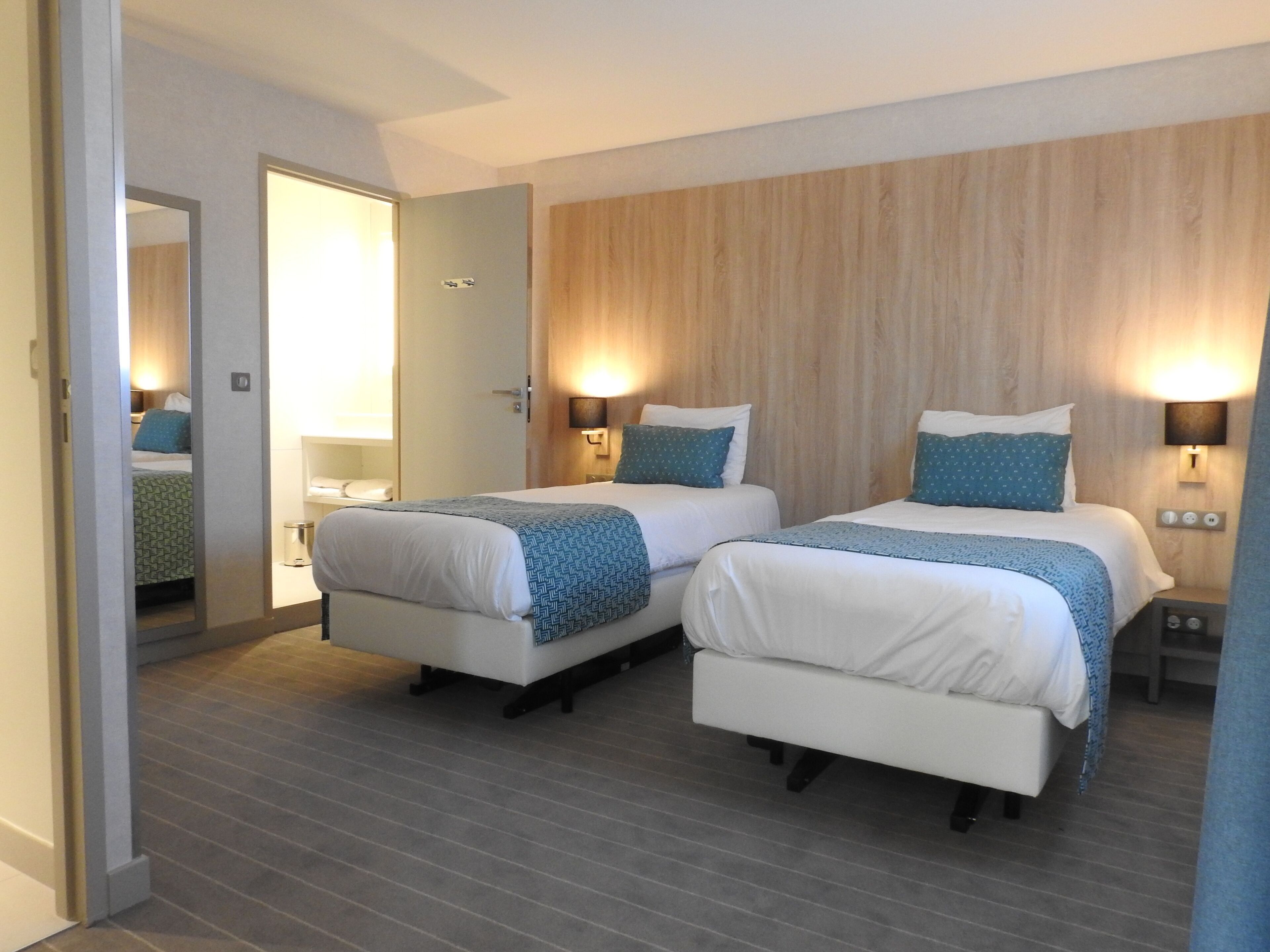 Premium bedding, memory foam beds, in-room safe, desk