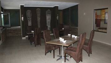 Breakfast, lunch, dinner served; local and international cuisine