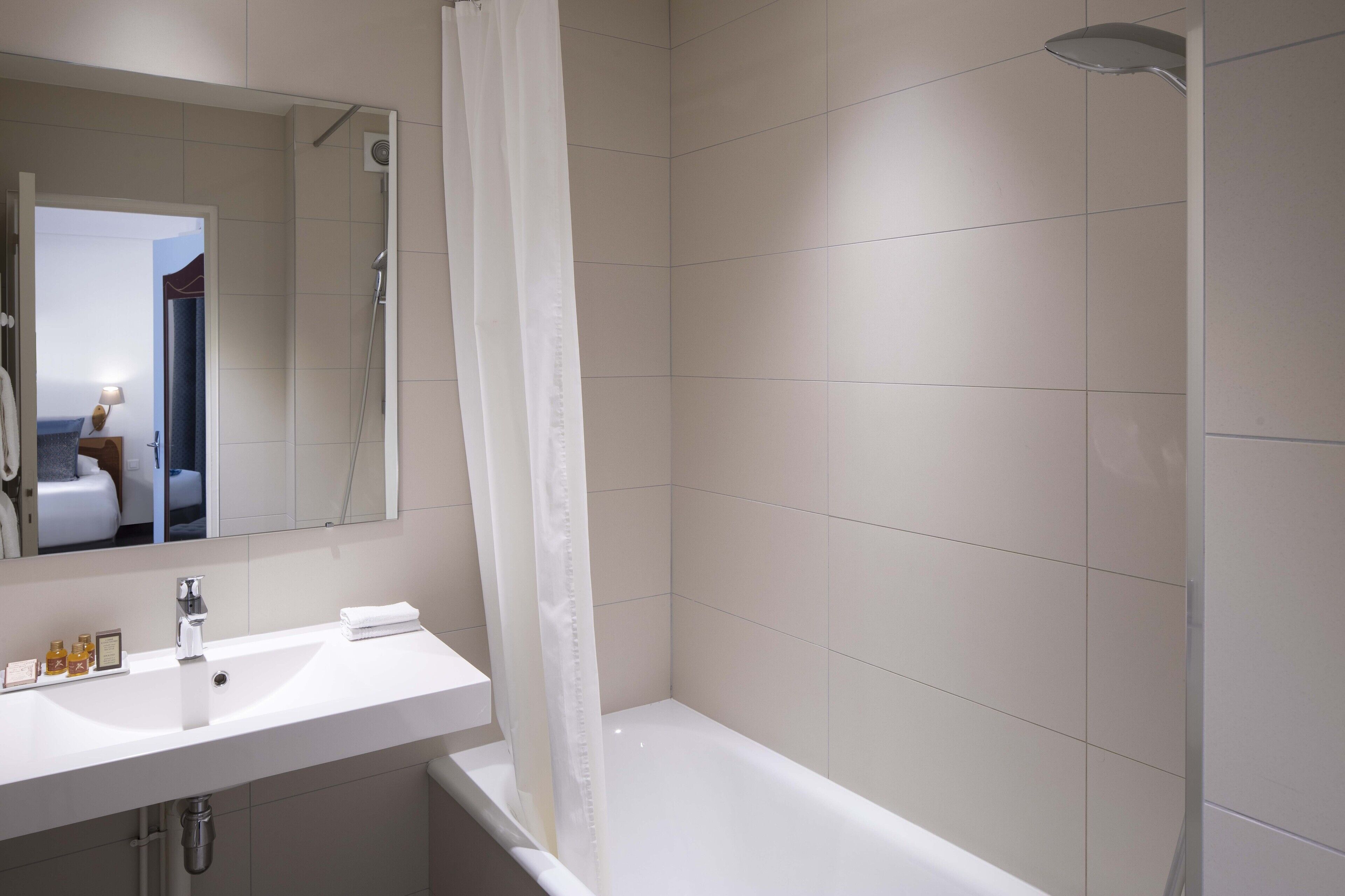 family room | bathroom | free toiletries, hair dryer, towels