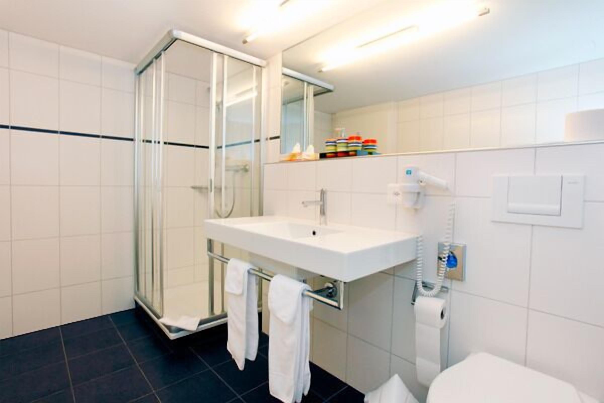 triple room, private bathroom | bathroom | shower, hair dryer, towels