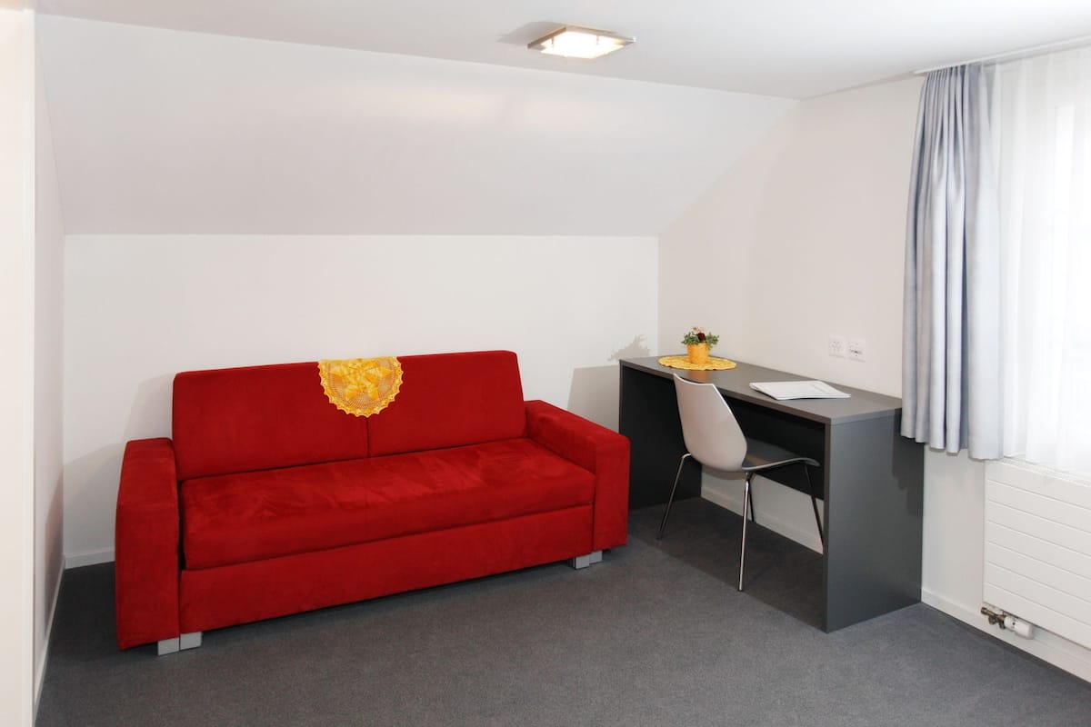 triple room, private bathroom | desk, blackout curtains, soundproofing, free cots/infant beds