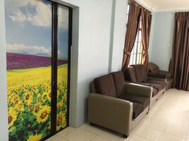 Standard Apartment, 3 Bedrooms | Living room | Flat-screen TV