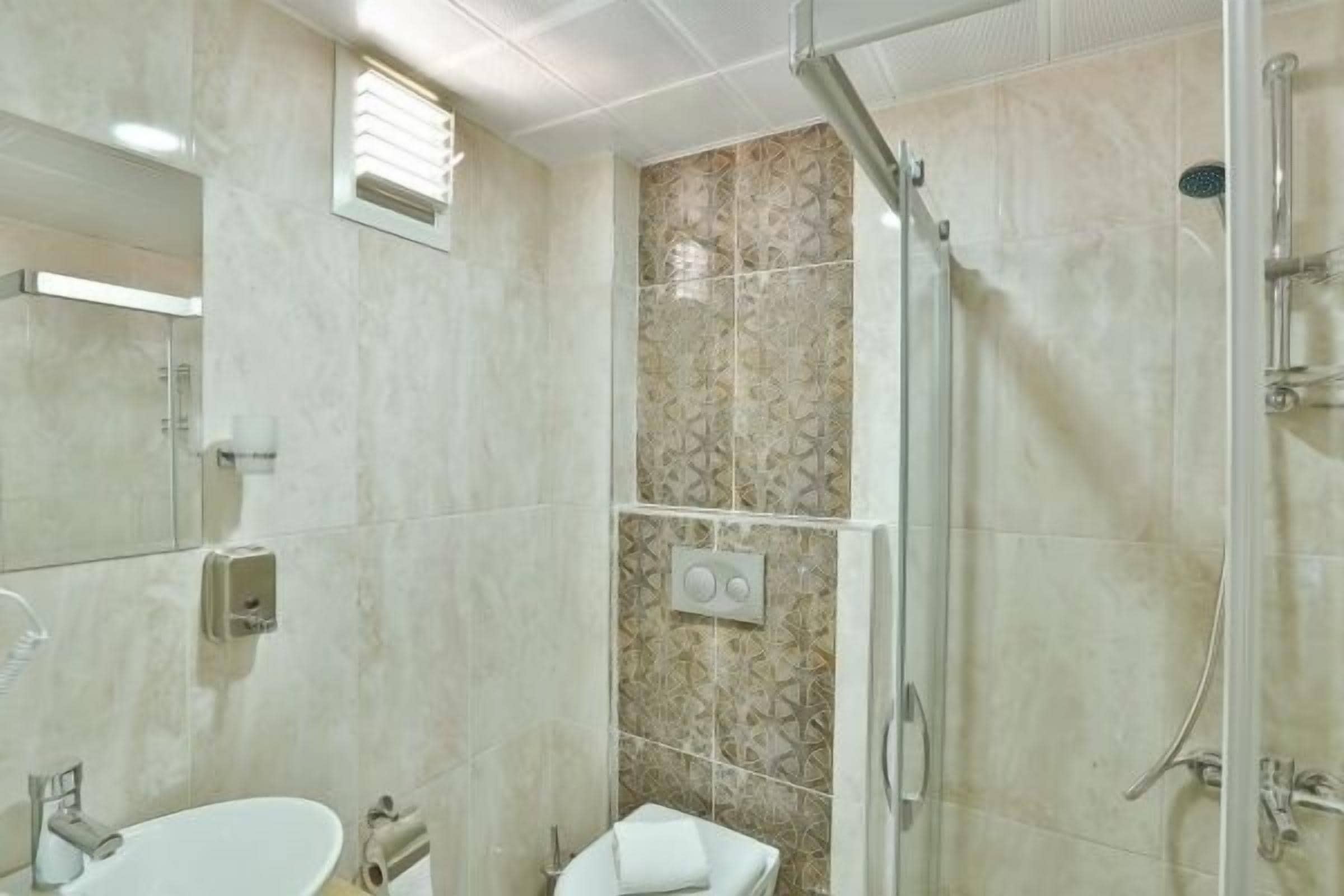 shower, free toiletries, hair dryer, slippers