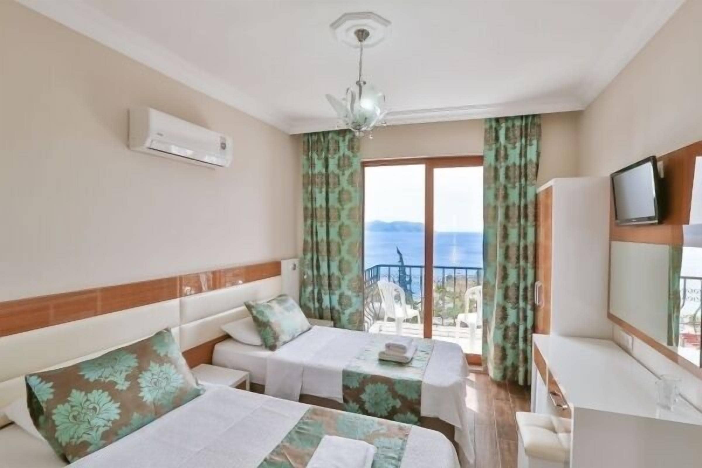 triple room, sea view | minibar, free wifi