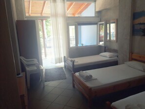 Family Apartment, 2 Bedrooms | Free cribs/infant beds, free WiFi, bed sheets