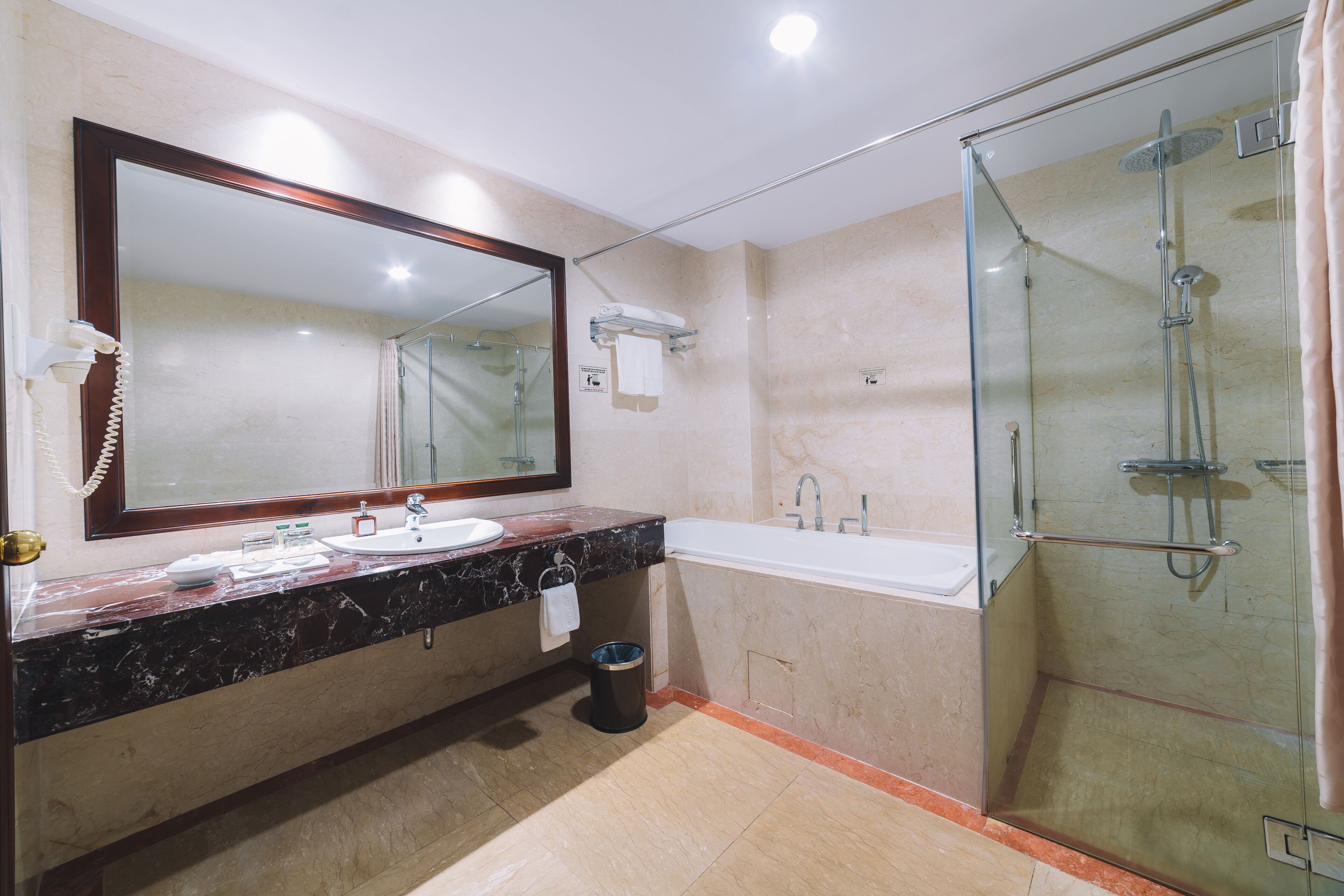 executive suite | bathroom | free toiletries, hair dryer, slippers, towels
