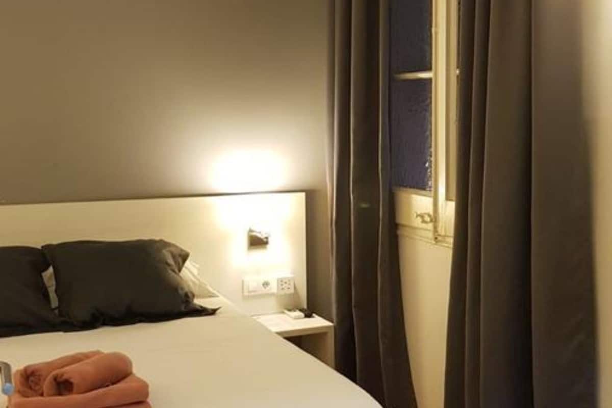 Budget Room (bathroom outside, no balcony, no views) | In-room safe, blackout drapes, soundproofing, free WiFi