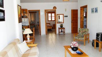 Apartment, 2 Bedrooms | Living area | TV