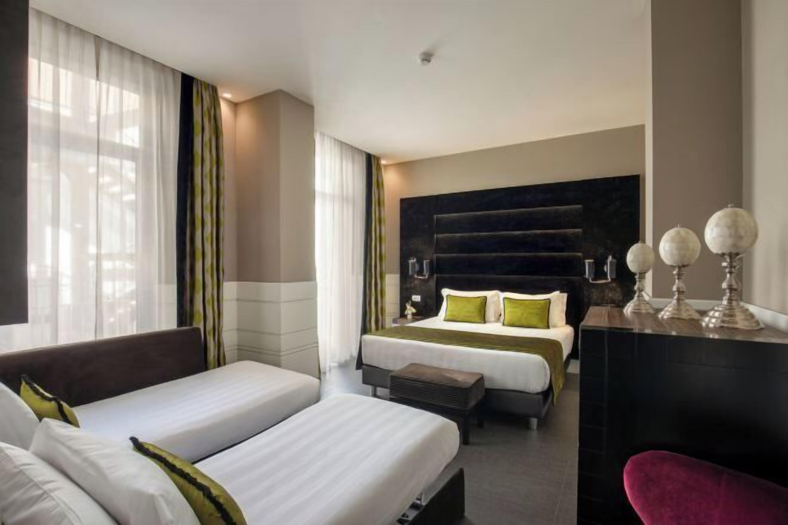 Premium bedding, down comforters, minibar, in-room safe