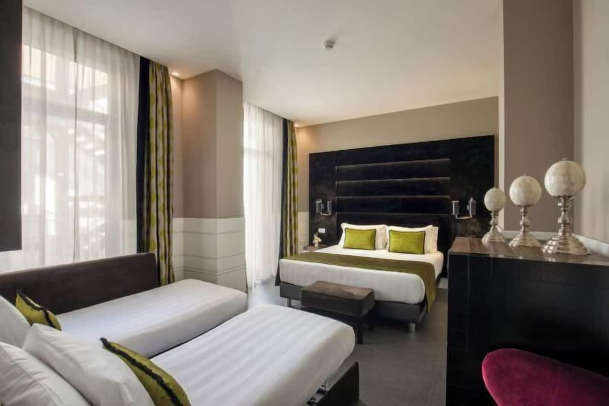 Premium bedding, down comforters, minibar, in-room safe