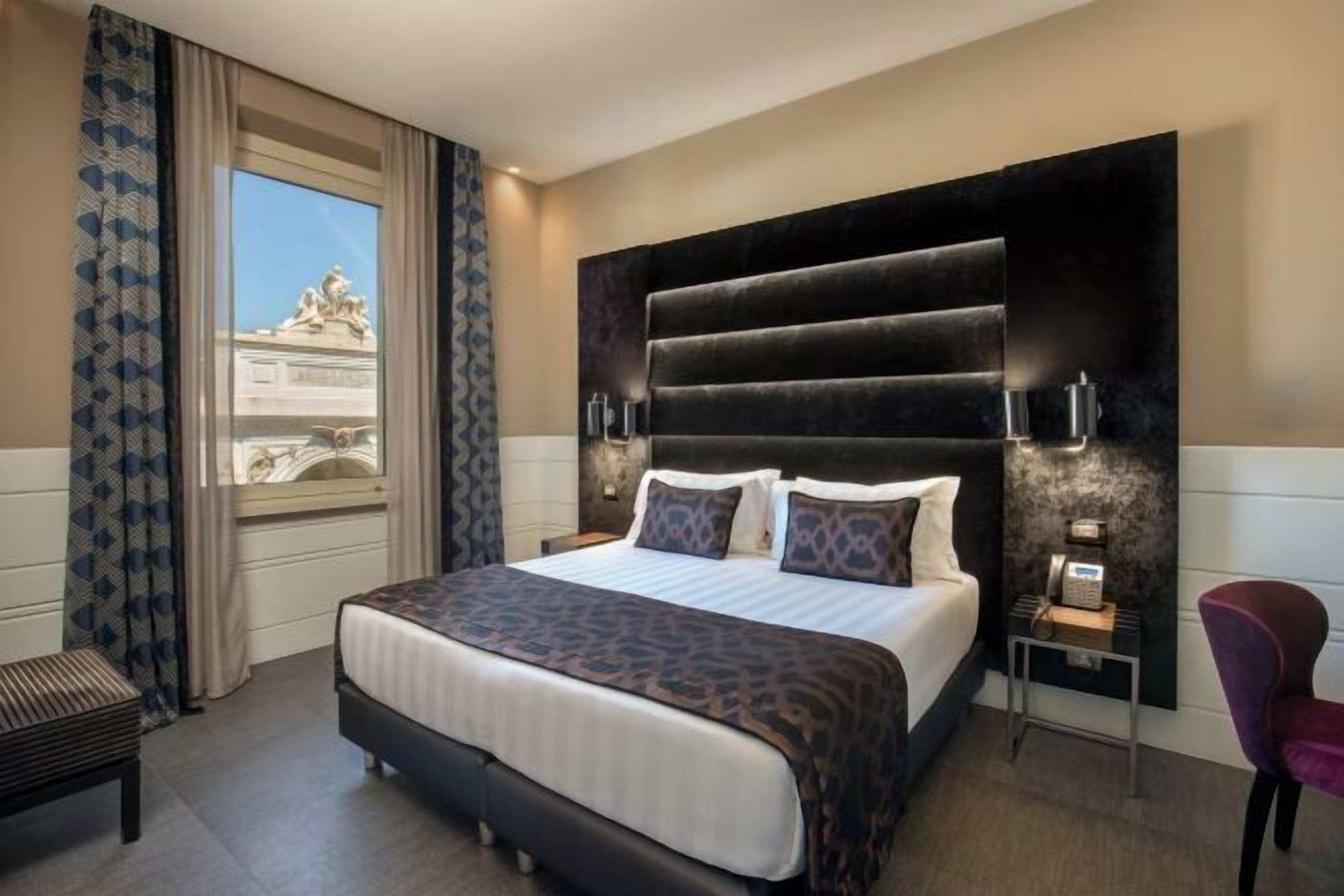Premium bedding, down comforters, minibar, in-room safe