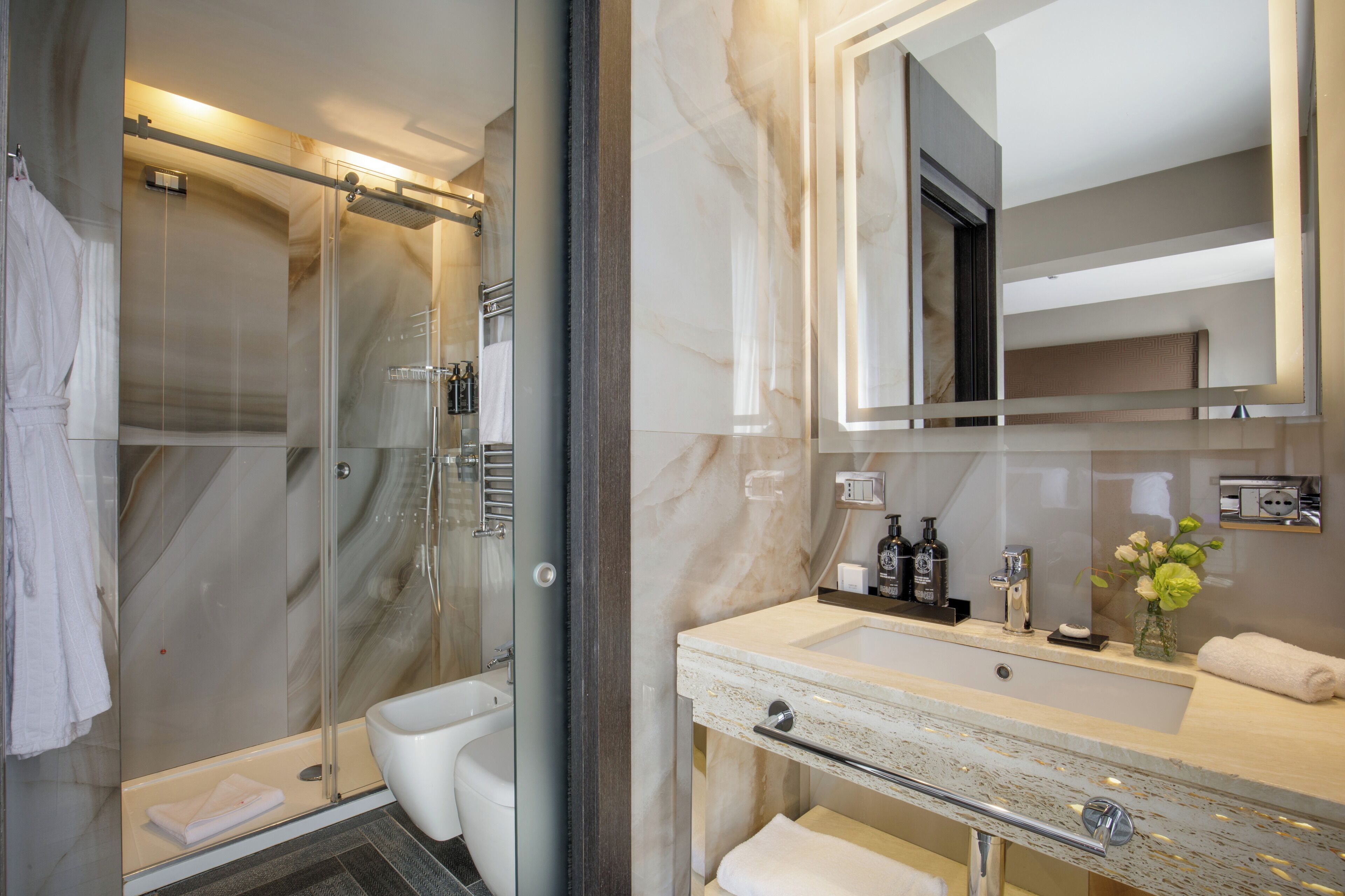 junior suite | bathroom | eco-friendly toiletries, hair dryer, bathrobes, bidet