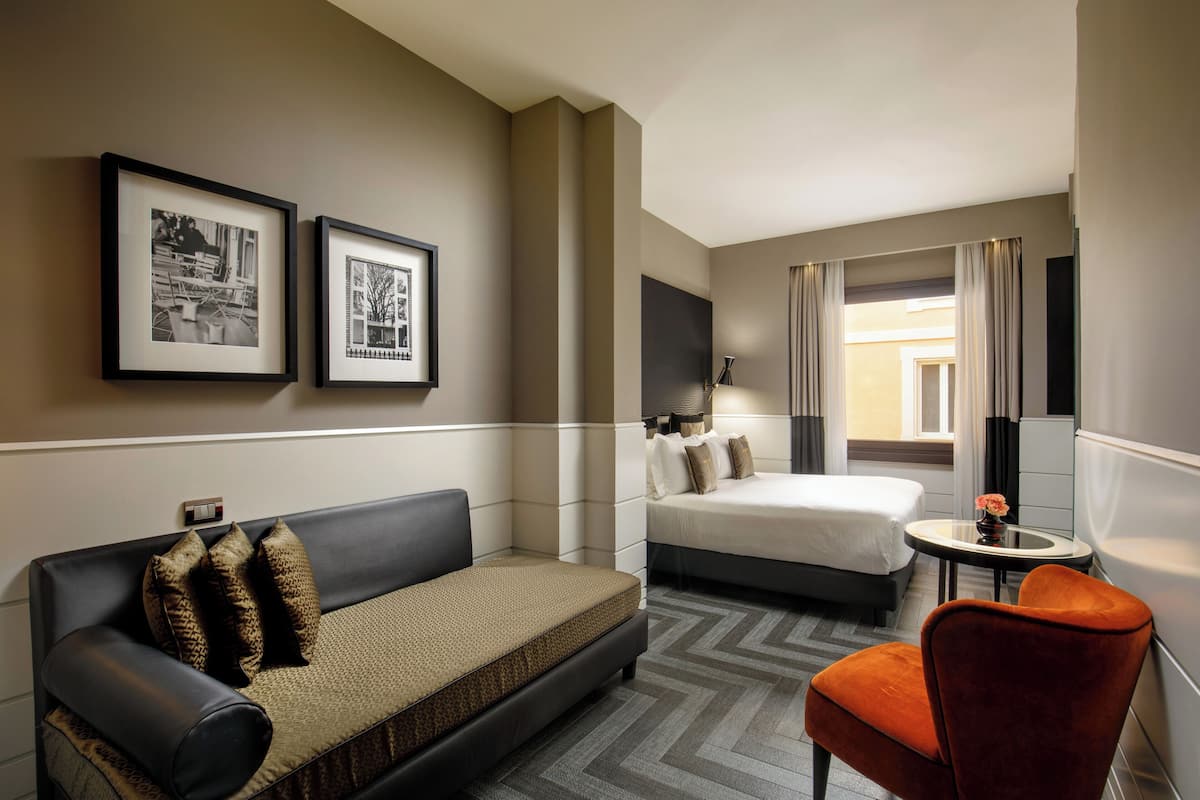 Habitación Premium | Ropa de cama de alta calidad, edredón y minibar