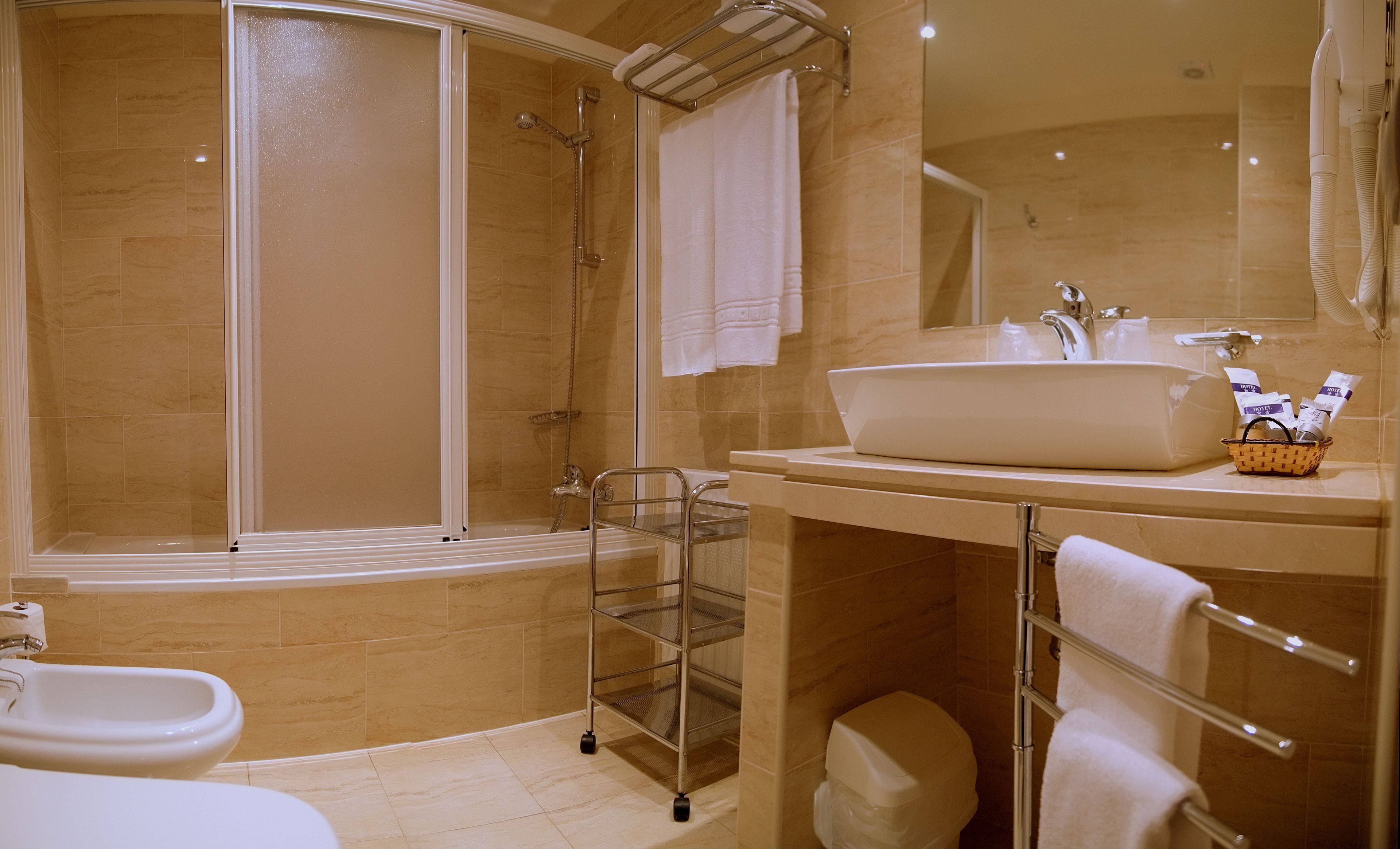 family room | bathroom | free toiletries, hair dryer, bidet, towels