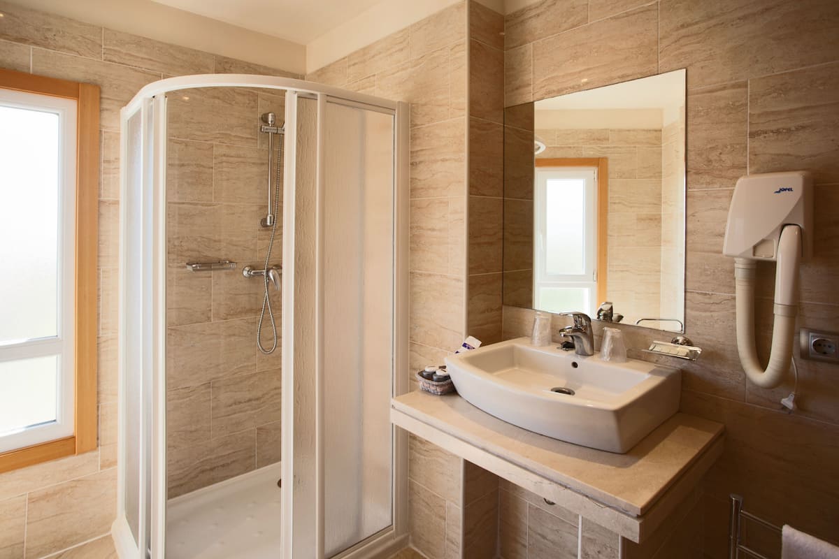 free toiletries, hair dryer, bidet, towels