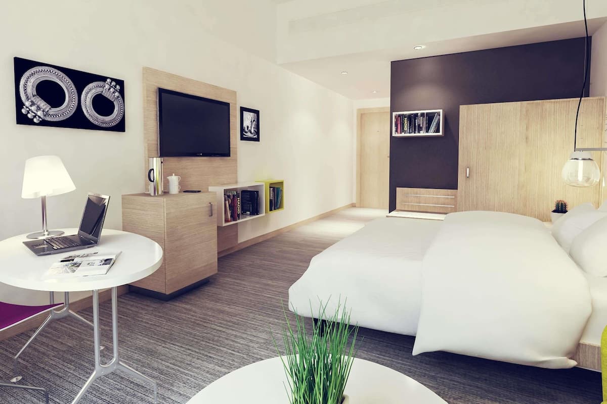 Premium bedding, in-room safe, desk, soundproofing