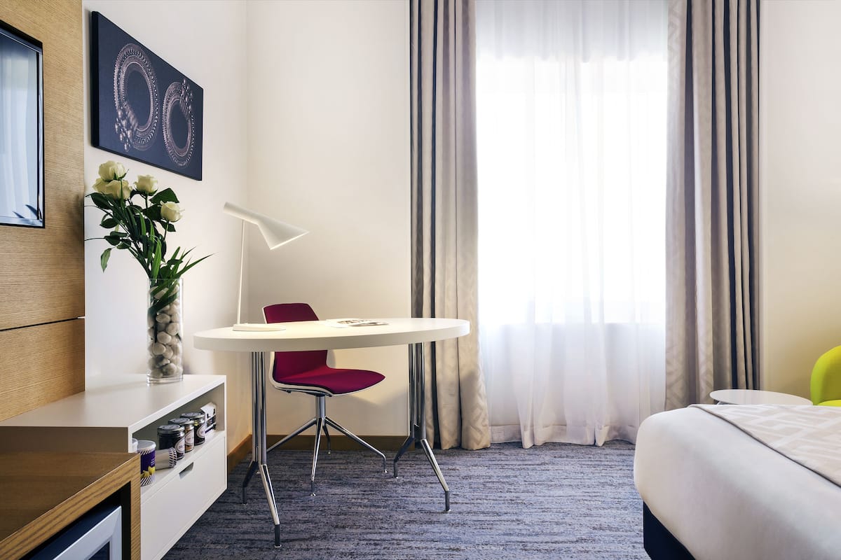 Premium bedding, in-room safe, desk, soundproofing