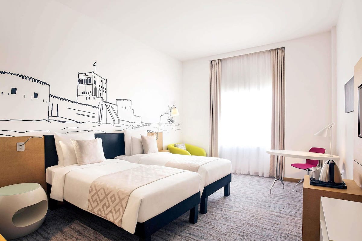 Premium bedding, in-room safe, desk, soundproofing