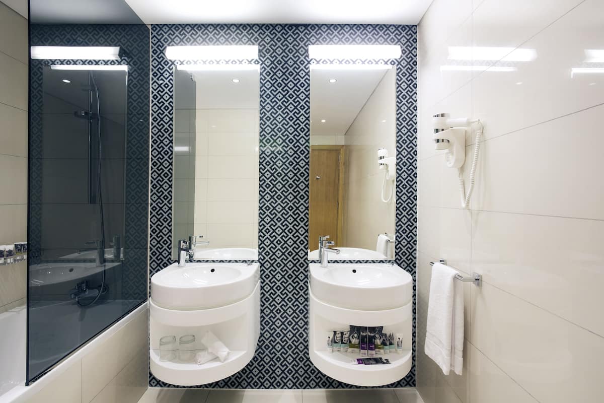 Eco-friendly toiletries, hair dryer, towels