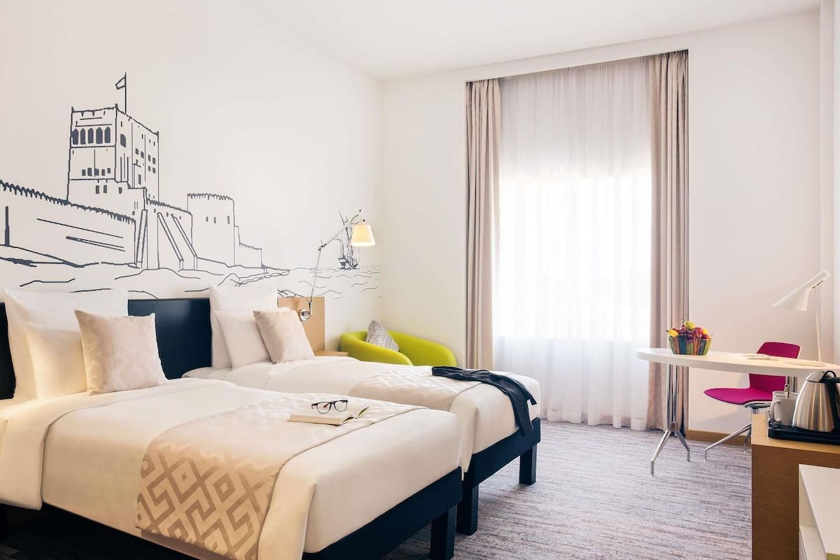 Premium bedding, in-room safe, desk, soundproofing