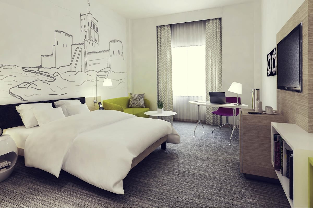 Premium bedding, in-room safe, desk, soundproofing