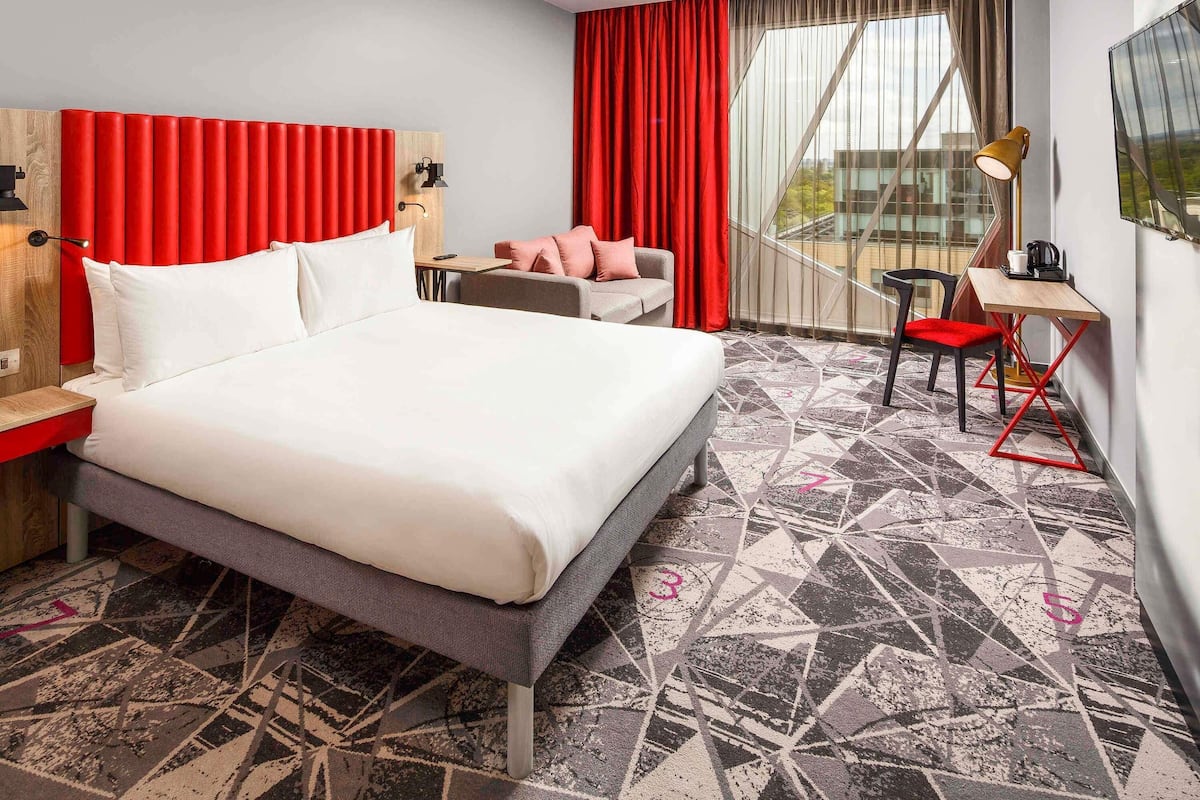 Desk, laptop workspace, blackout drapes, soundproofing