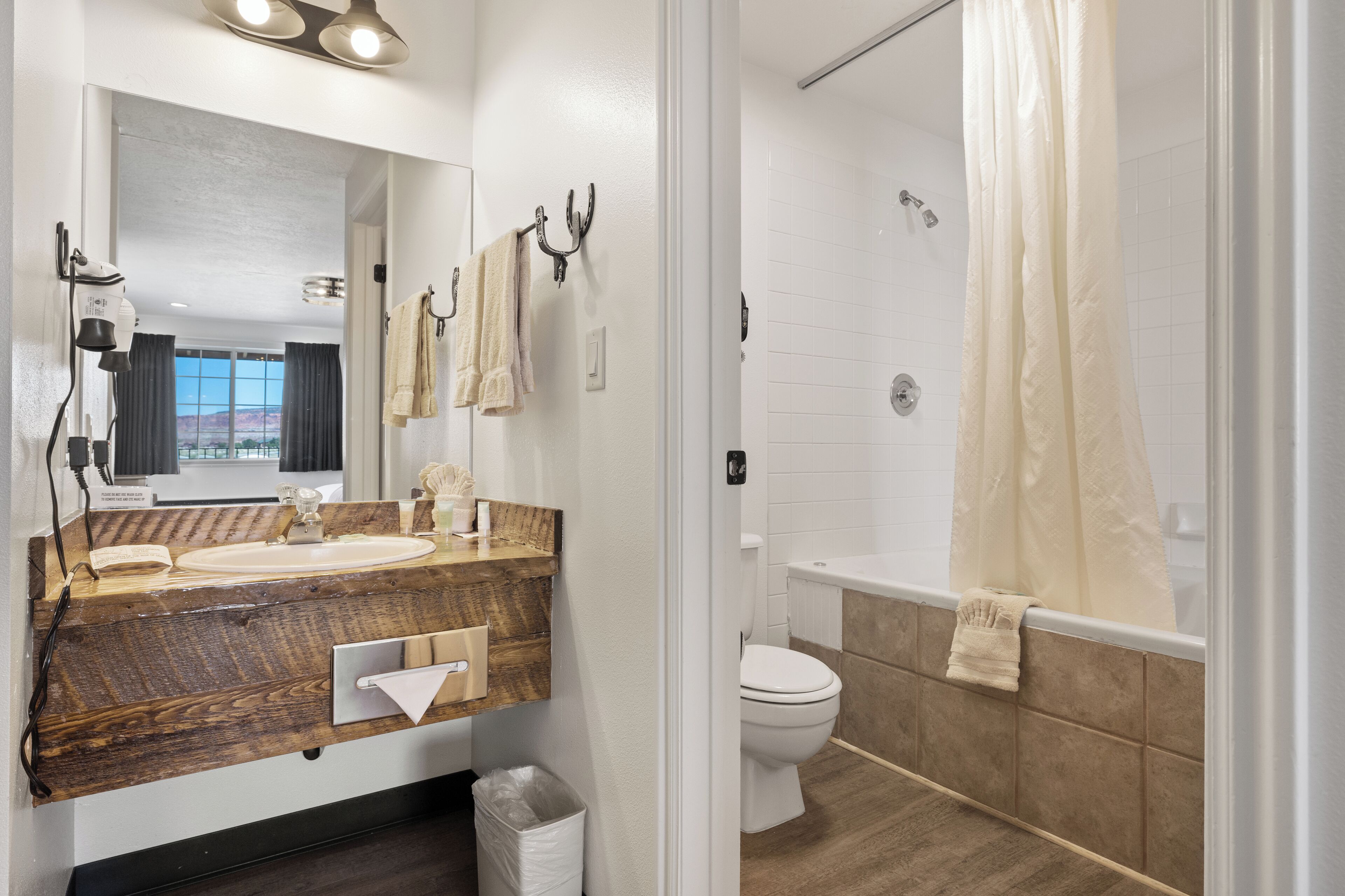 suite, 1 king bed, jetted tub, mountain view | bathroom | combined shower/bathtub, free toiletries, hair dryer, towels