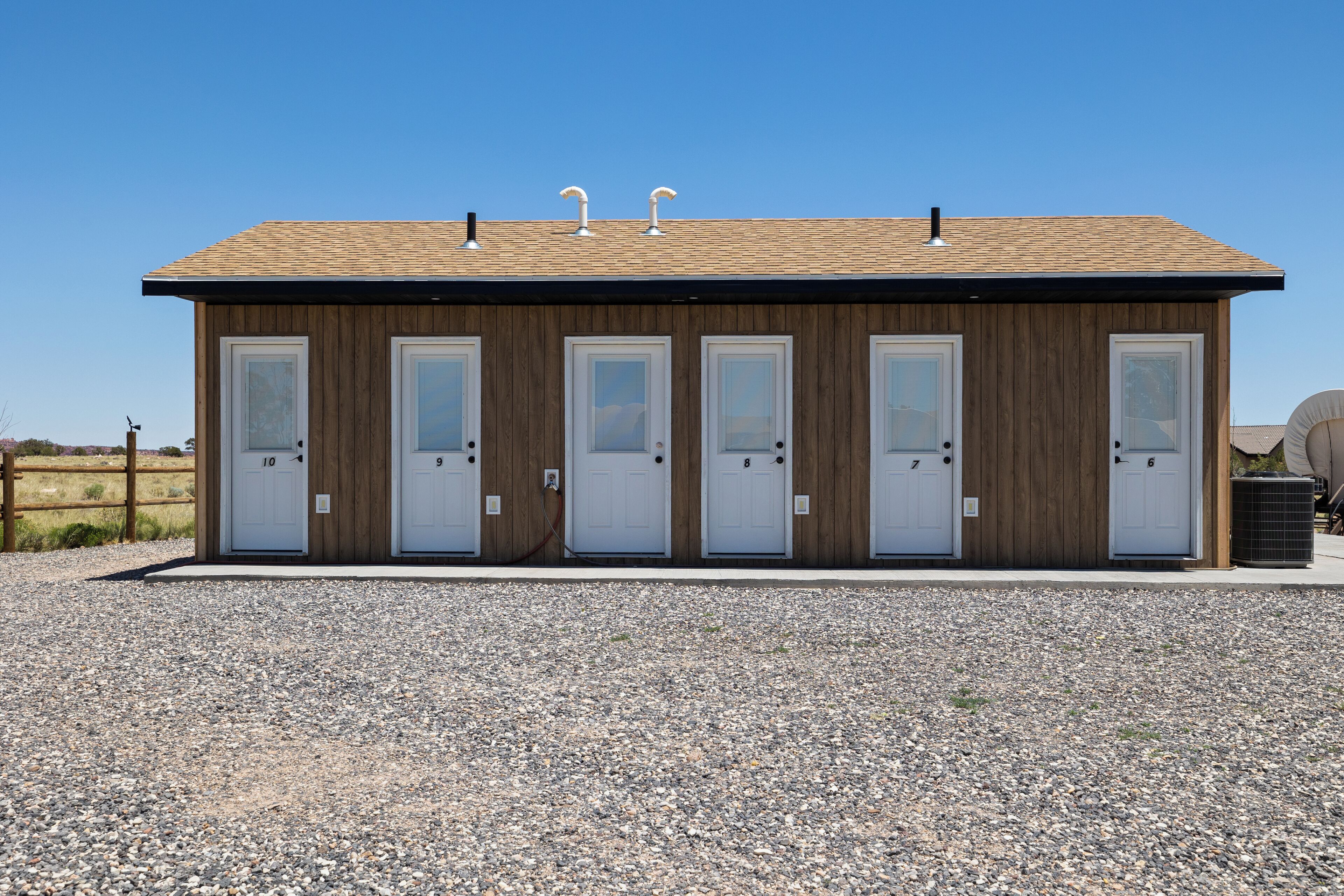 conestoga wagon private bathroom outside | bathroom | combined shower/bathtub, free toiletries, hair dryer, towels