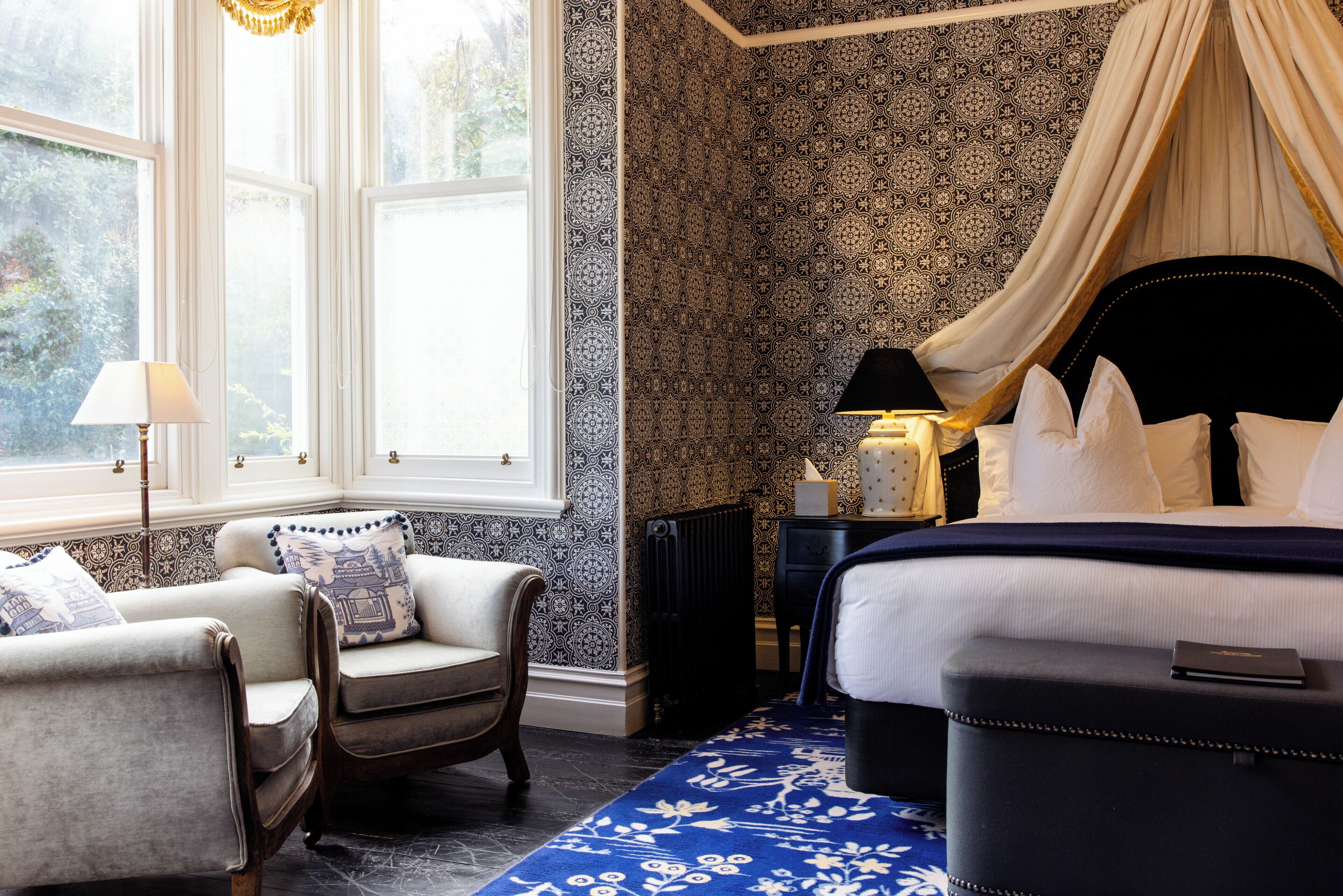 尊荣套房, 花园景观 | 1 多间卧室、高档床上用品、客房内保险箱、办公桌