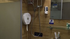 A bathroom with a toilet, sink, and shower. - 3D Inn - Romance (Kowloon)