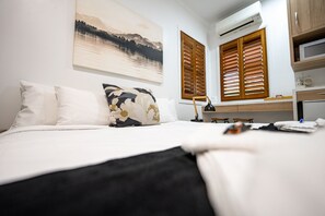 1 chambre, literie de qualité, minibar, décor unique