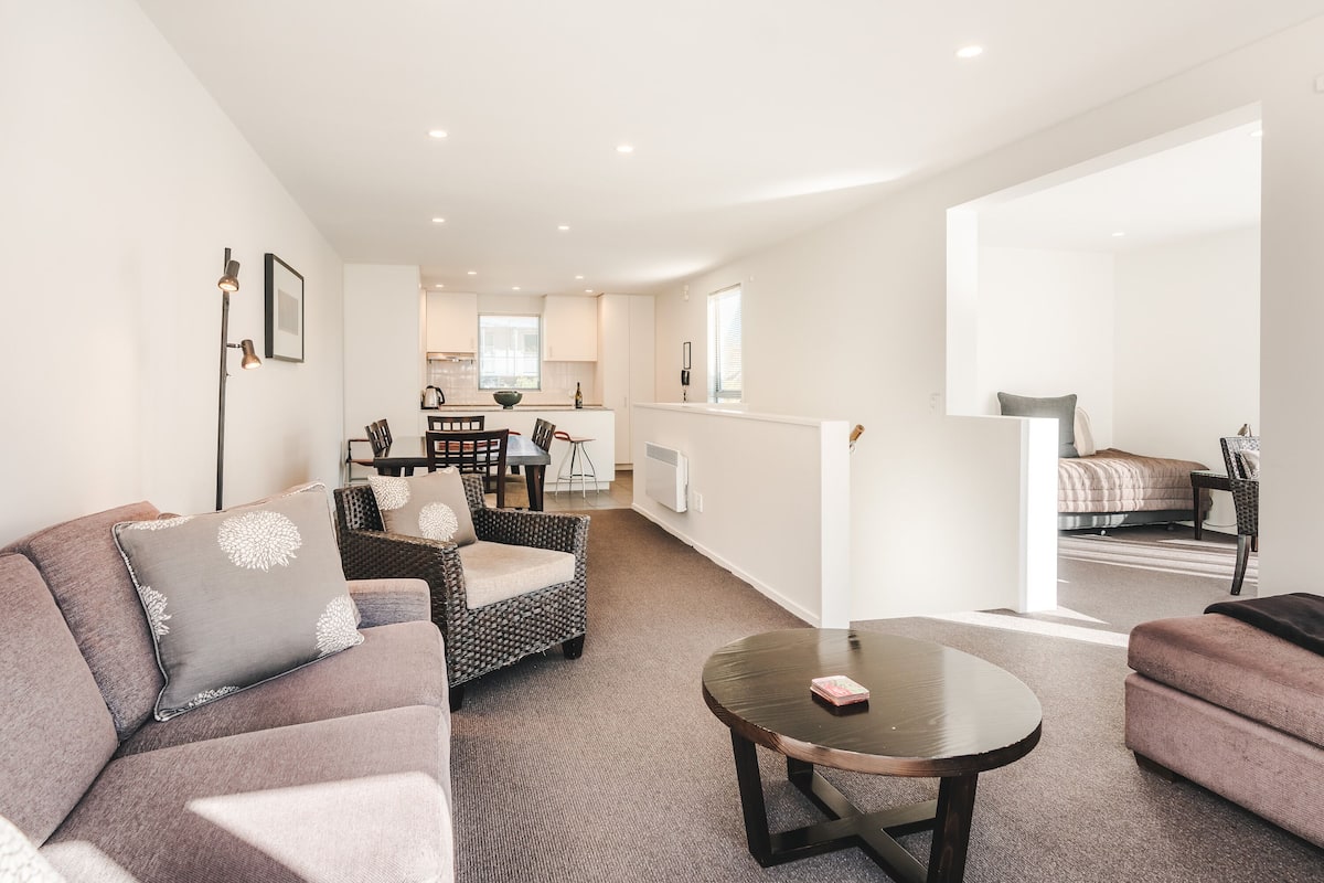 Three Bedroom Apartment | Living area | 32-inch TV with cable channels, DVD player, iPod dock