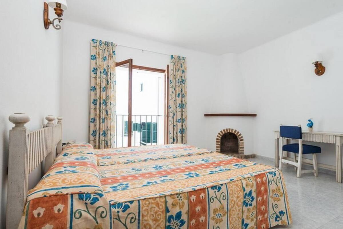 Desk, laptop workspace, blackout curtains, free WiFi