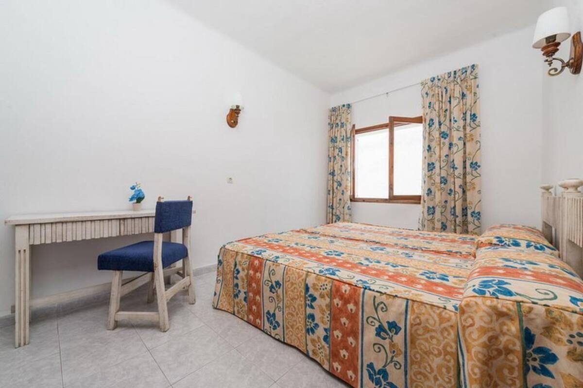 Desk, laptop workspace, blackout curtains, free WiFi