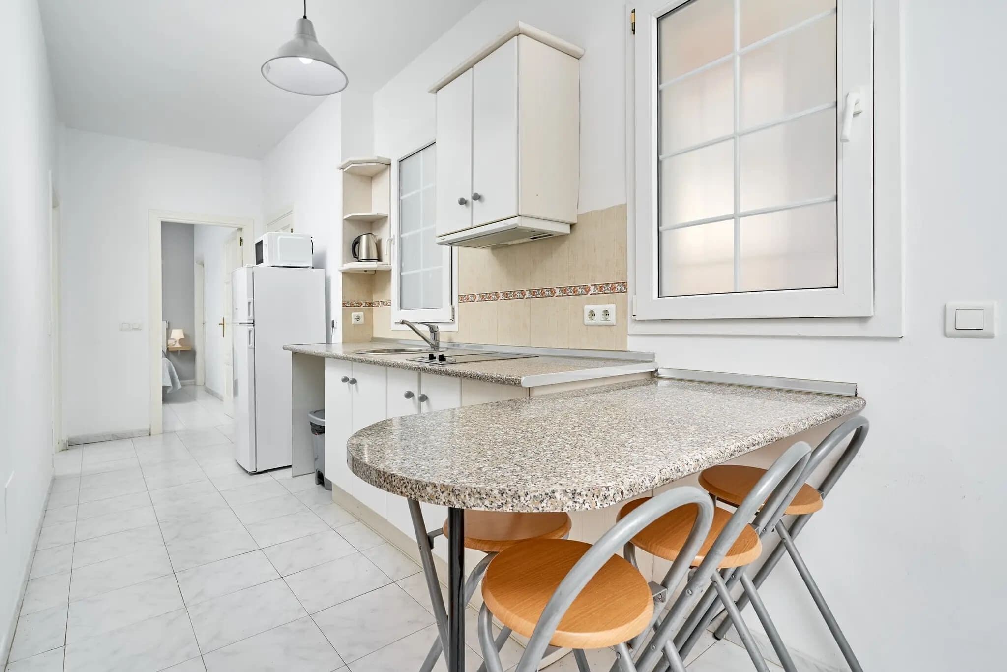 Deluxe Apartment, 2 Bedrooms, Terrace, Poolside (Apartamento BA) | Private kitchen | Full-size fridge, microwave, stovetop, coffee/tea maker