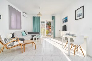 Deluxe Apartment, 1 Bedroom, Terrace, Pool View (Apartamento N1) | Living area | Flat-screen TV - Apartamentos Turísticos Almoraide (Nerja)