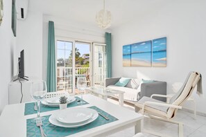 Deluxe Apartment, 1 Bedroom, Terrace, Pool View (Apartamento N2) | Living area | Flat-screen TV - Apartamentos Turísticos Almoraide (Nerja)