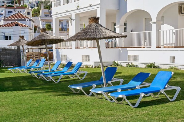 Outdoor pool, open 10:00 AM to 8:00 PM, sun loungers