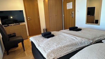 Desk, laptop workspace, free WiFi, bed sheets