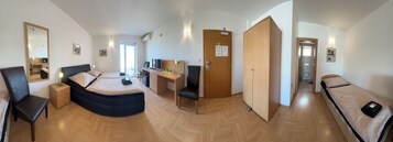 Triple Room | Desk, laptop workspace, WiFi (free), bed sheets