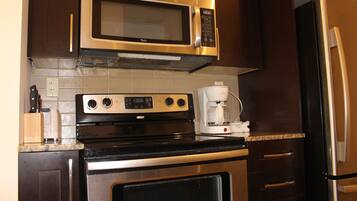 Luxury Condo, 1 Bedroom, Balcony, City View | Private kitchen | Full-sized fridge, microwave, oven, stovetop