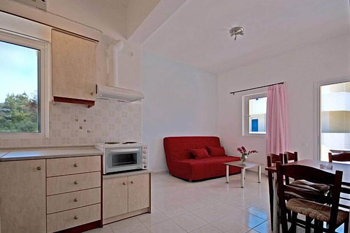 Grand Apartment | Living area | Flat-screen TV