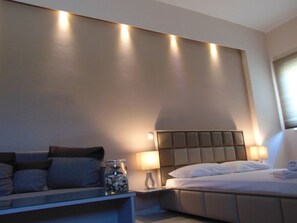 Executive Room | Soundproofing, iron/ironing board, free cots/infant beds, rollaway beds