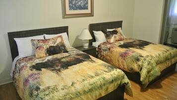 Standard Quadruple Room, 2 Double Beds | Free WiFi, bed sheets