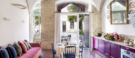 Studio | Living area | 28-inch flat-screen TV with satellite channels, TV, toys