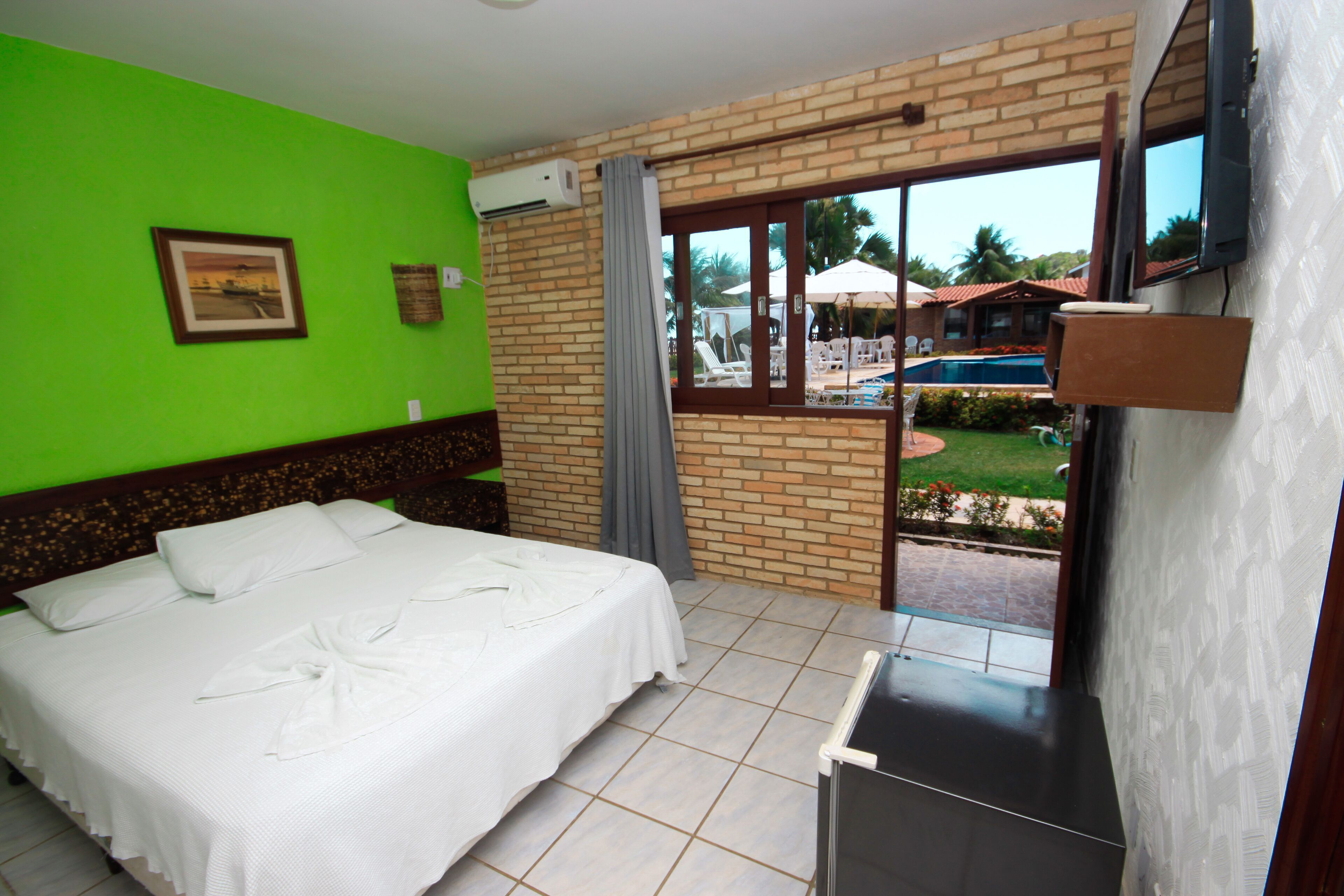 Minibar, rideaux d’obscurcissement, fer et planche à repasser