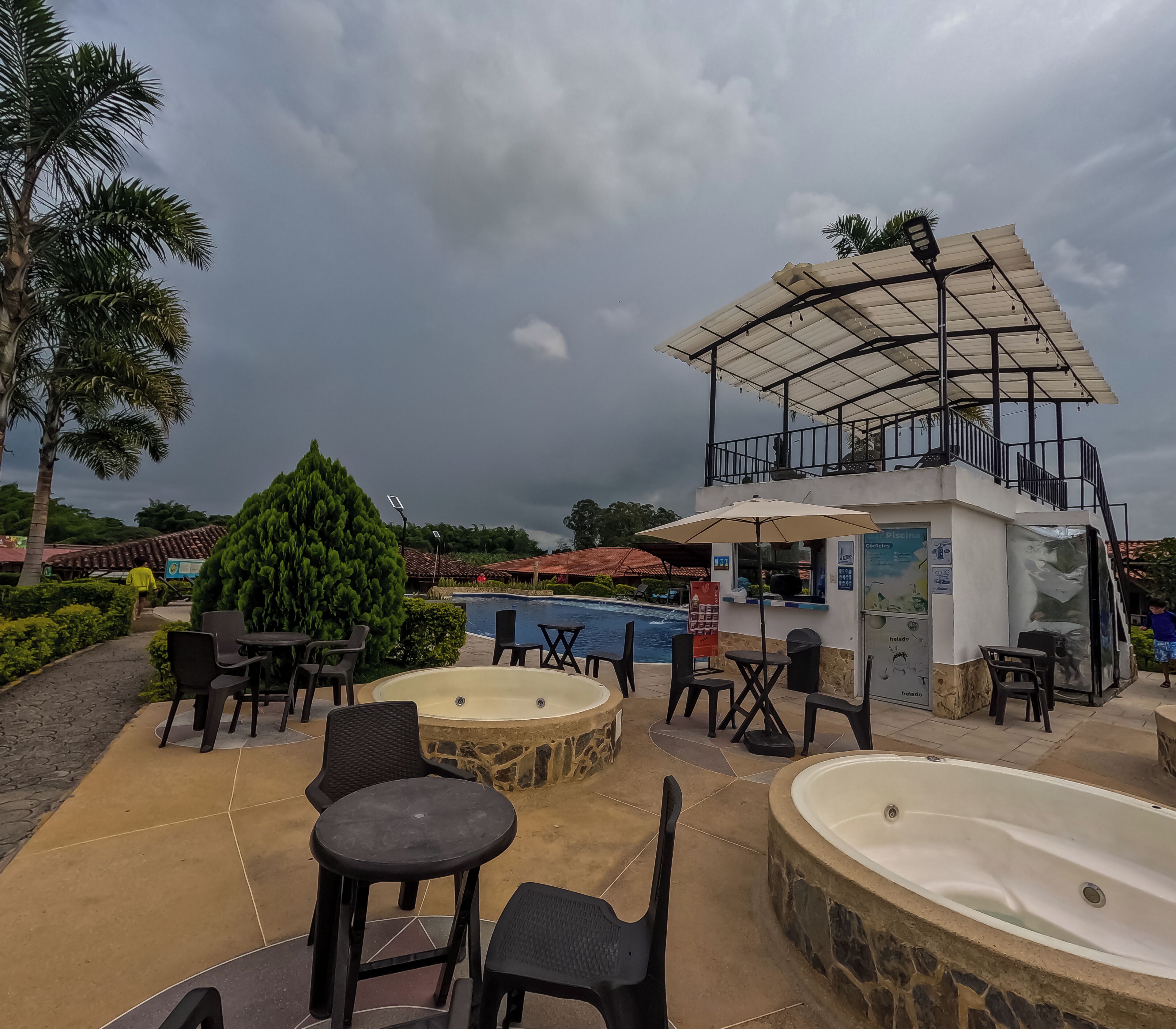 outdoor pool, open 10:00 am to 10:00 pm, pool umbrellas, pool loungers