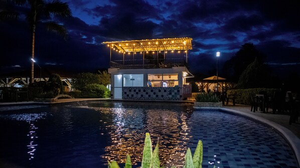 Outdoor pool, open 10:00 AM to 10:00 PM, pool umbrellas, sun loungers