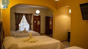 Desk, laptop workspace, free WiFi, bed sheets